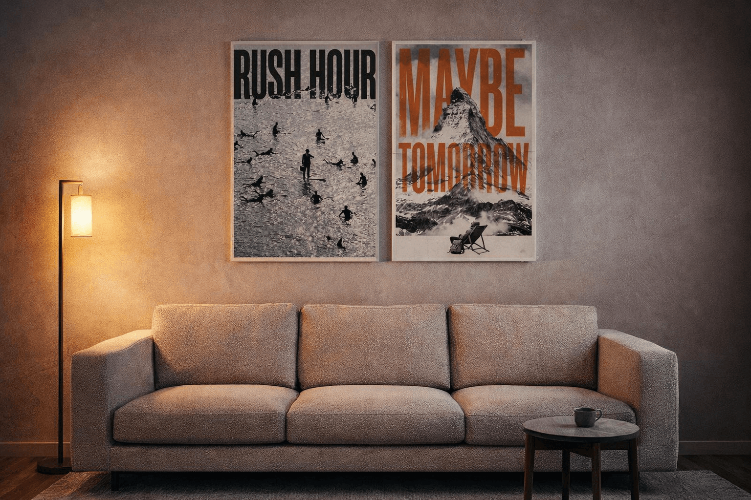 Two 60×90 cm posters hung side by side above a sofa, bottom edges aligned 15 cm over the backrest